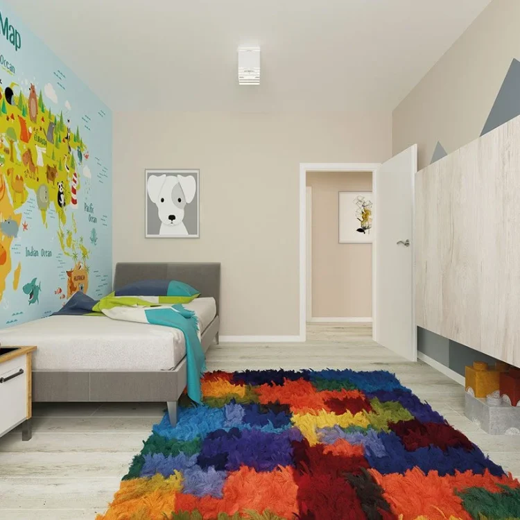 Kinderzimmer mit bunter Weltkarte an der Wand, grauem Bett und mehrfarbigem Teppich in modernem Bungalow