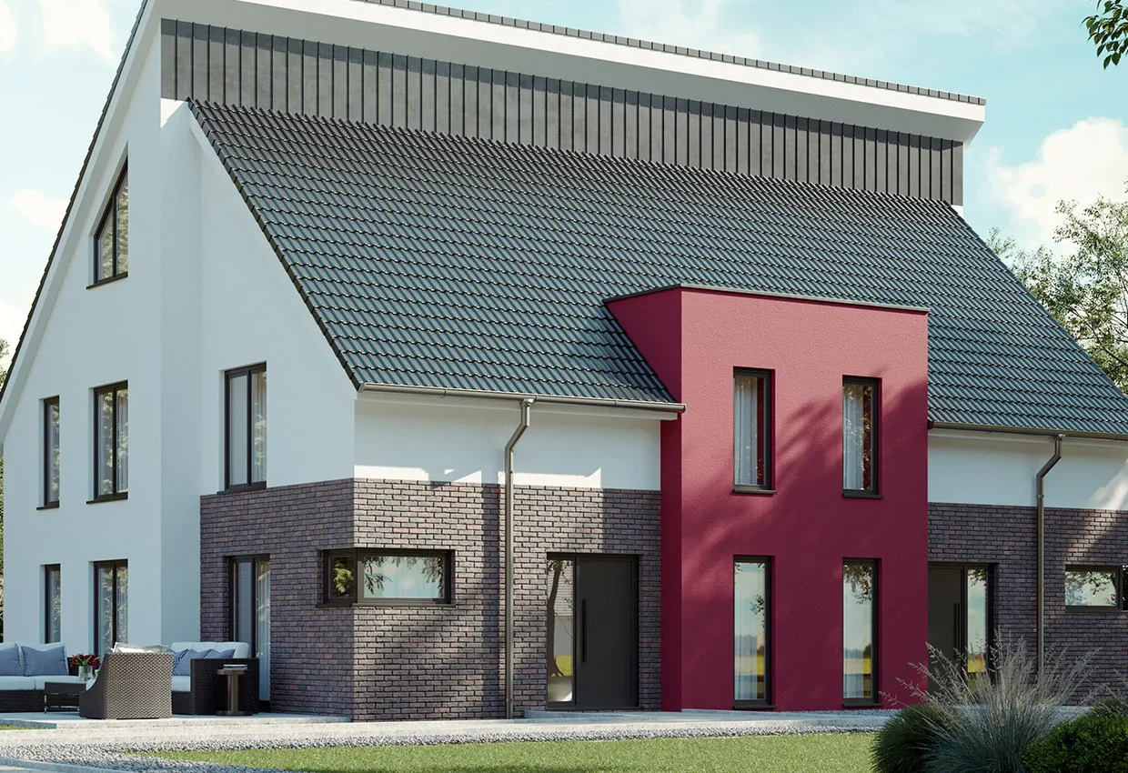 Modernes Doppelhaus mit weißer und roter Fassade, Klinkerdetails und grauem Ziegeldach in grüner Umgebung