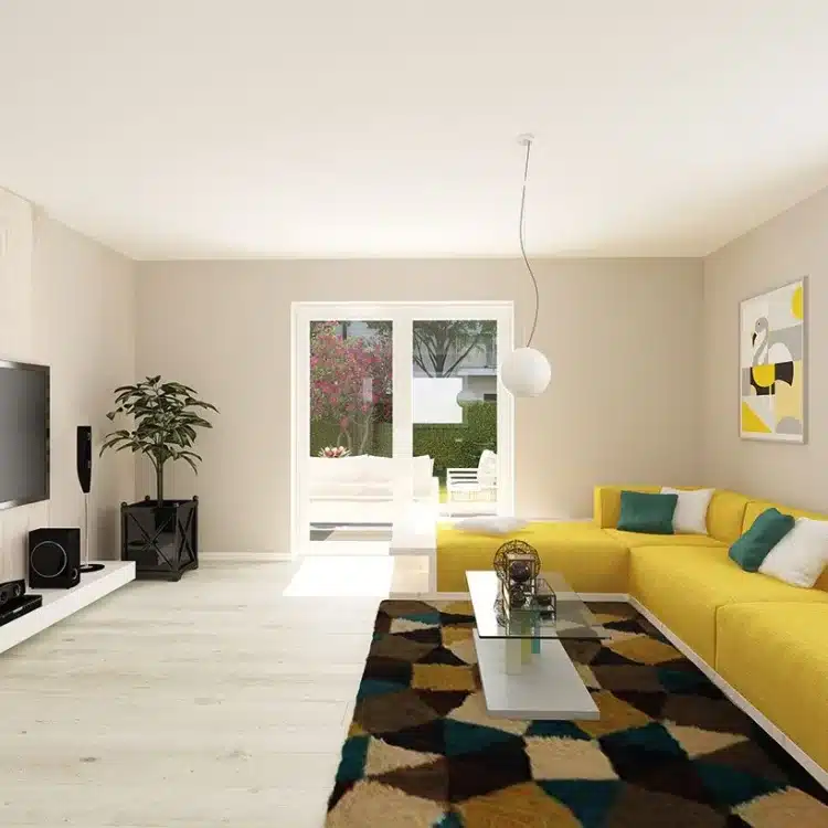 Modernes Wohnzimmer mit gelber Eckcouch, Glastisch, Wandfernseher und großem Fenster zur Terrasse