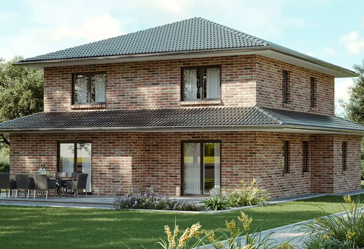 Moderne zweistöckige Stadtvilla mit Klinkersteinfassade, grauem Ziegeldach und großer Terrasse im gepflegten Garten